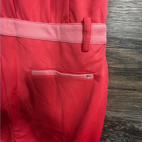 Galvin Green Coral Pink Sleeveless Golf Polo Romper with Waist Detail - Picture 12 of 13